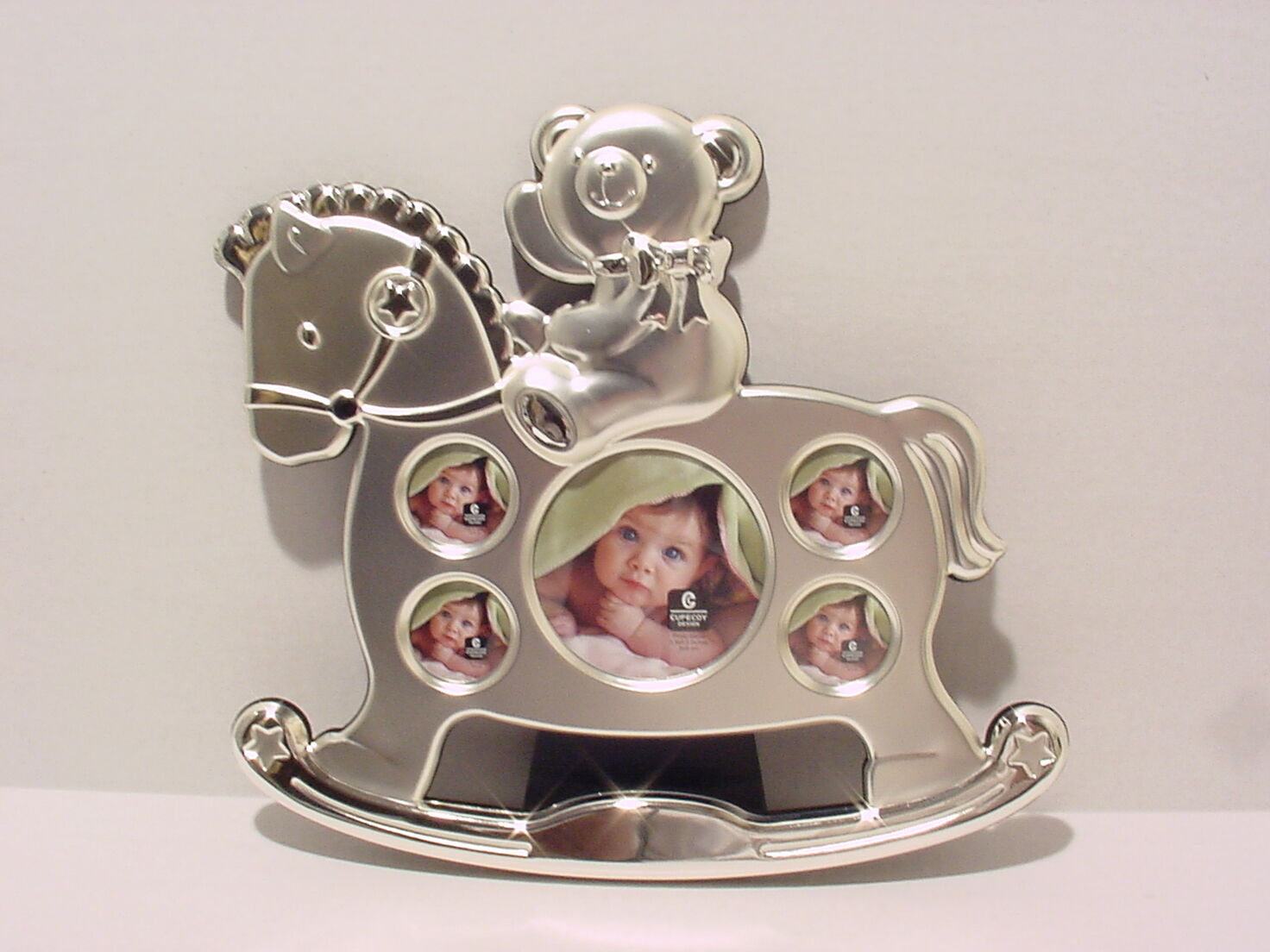 TWO TONE SILVER PLATED TEDDY ON ROCKING HORSE PHOTO FRAME