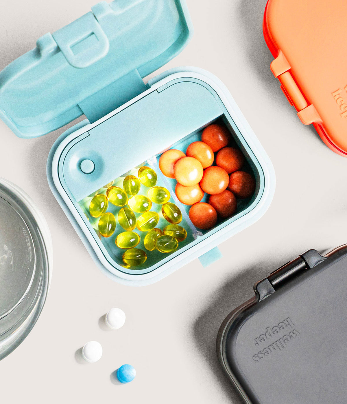 Wellness Keeper Mini Light-Up Pill and Vitamin Case Orange